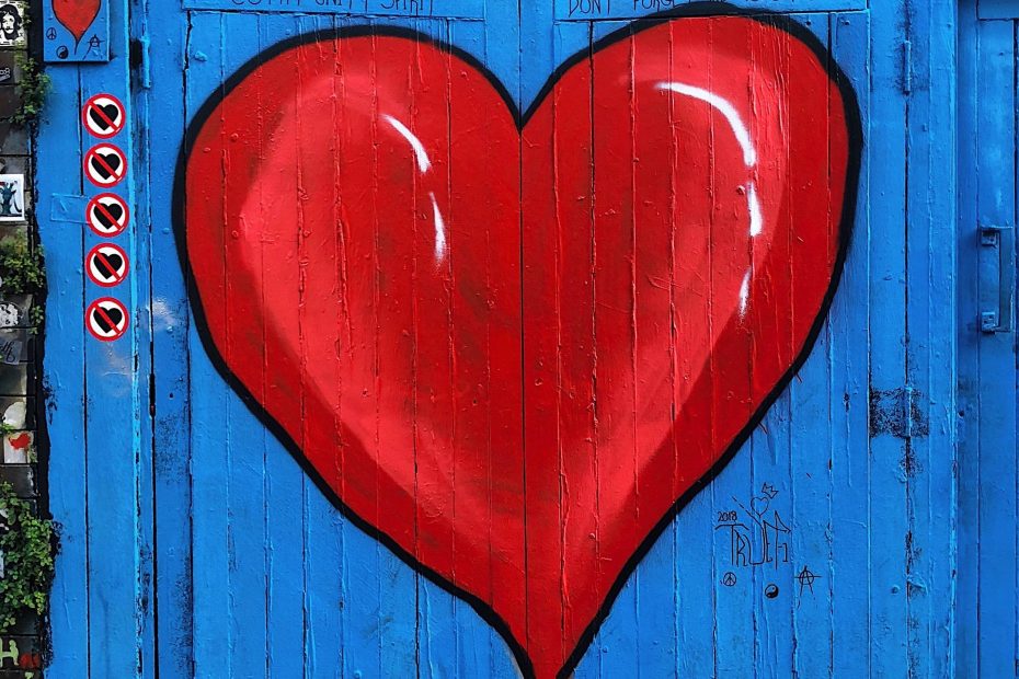 red heart on a blue fence